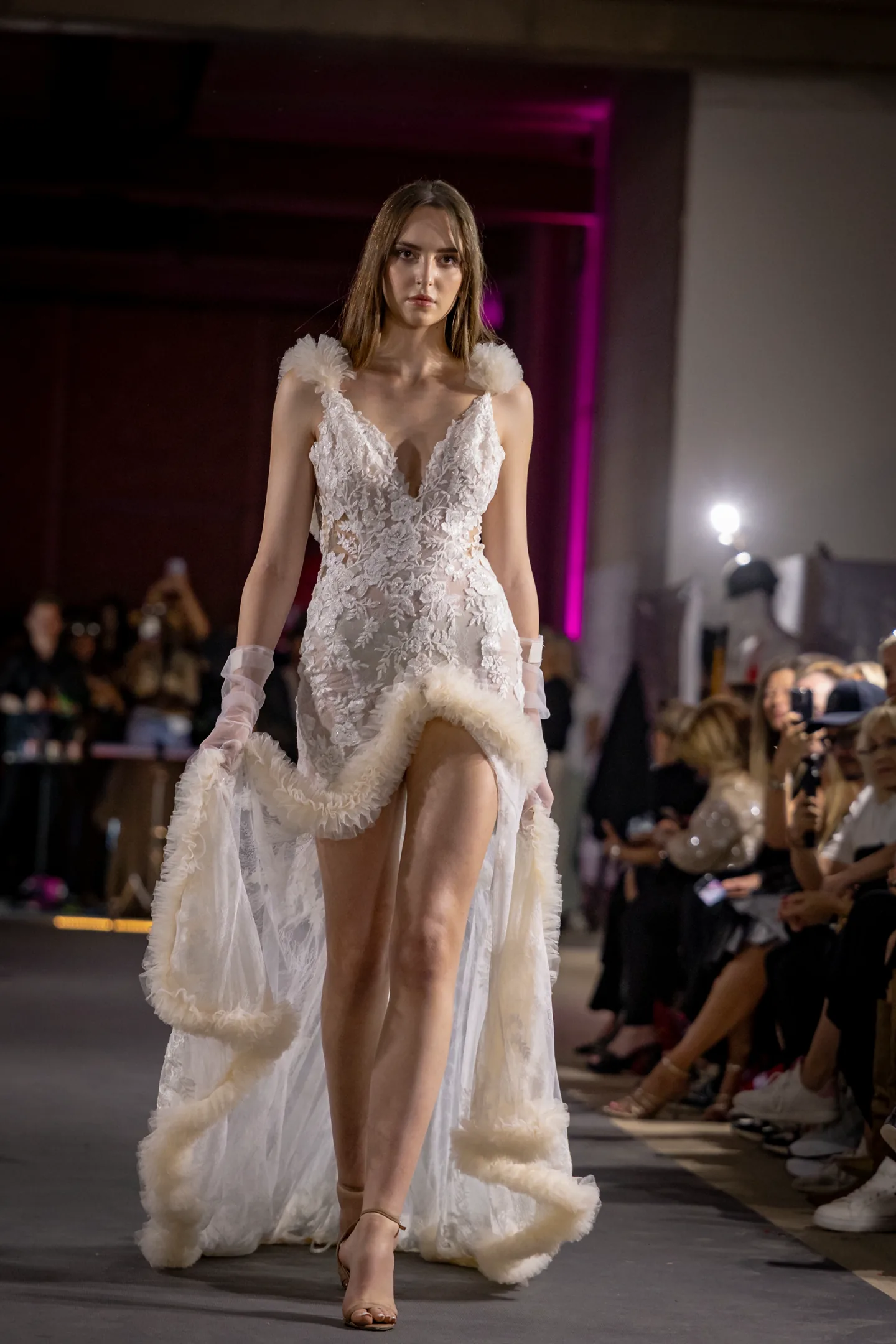 Portrait of a model in motion under mirrored light.